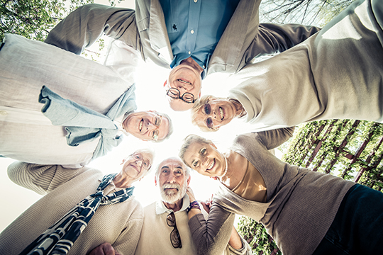 Group of seniors meeting outdoors. Group of seniors meeting outdoors.