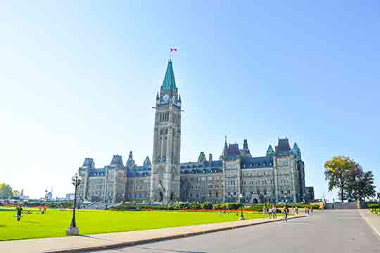 View of Parliament Hill in Ottawa on a sunny day View of Parliament Hill in Ottawa on a sunny day