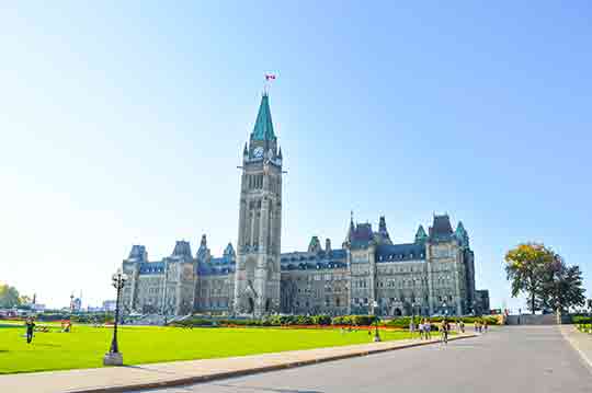 View of Parliament Hill in Ottawa on a sunny day