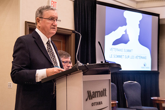 Association president, Jean-Guy Soulière, speaks at the Veterans Summit. Association president, Jean-Guy Soulière, speaks at the Veterans Summit.