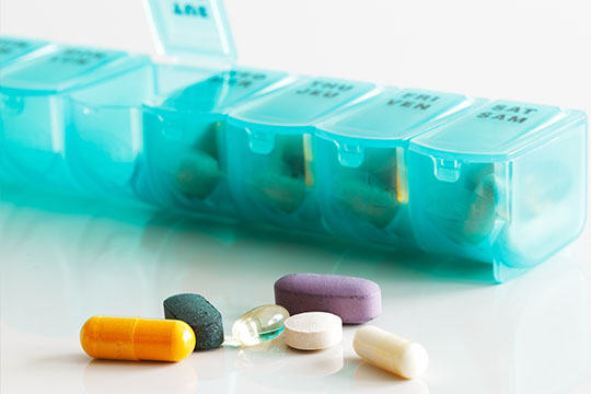 Filling a pill organizer Easing prescription limits in the time of COVID-19.