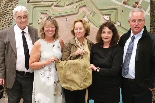 Lise Saint-Laurent Fleury, second from the left, holding the backpack surrounded by her siblings.