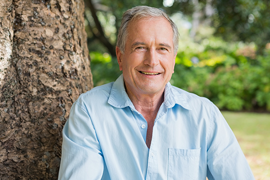 Take action as an advocacy program officer! Smiling adult man.