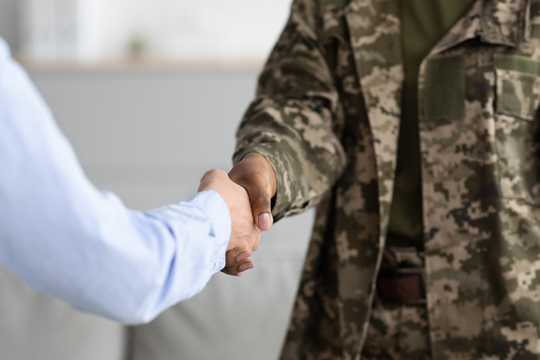 Shaking hands with a veteran.