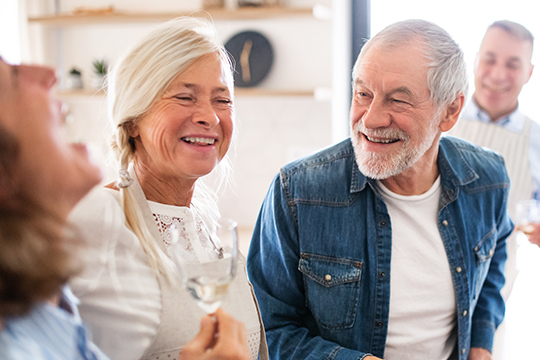Saskatchewan retirees deserve to age at home. Happy adult couple at home.