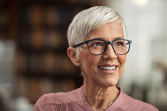 Pension indexing rate for 2023 Smiling adult woman.