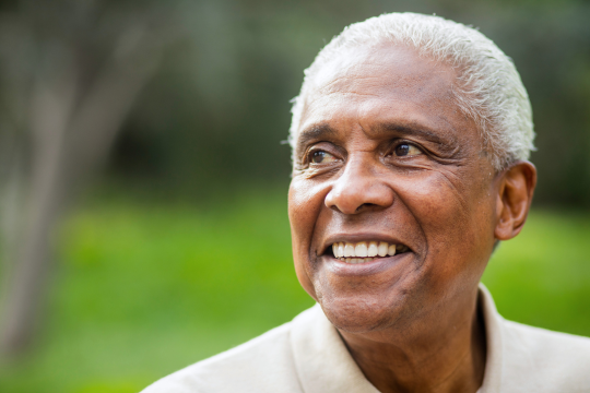 Canada needs a UN Convention on the Rights of Older Persons. Man looking away from camera.
