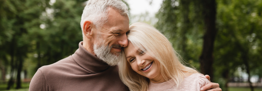 Smiling couple spending time outdoors.