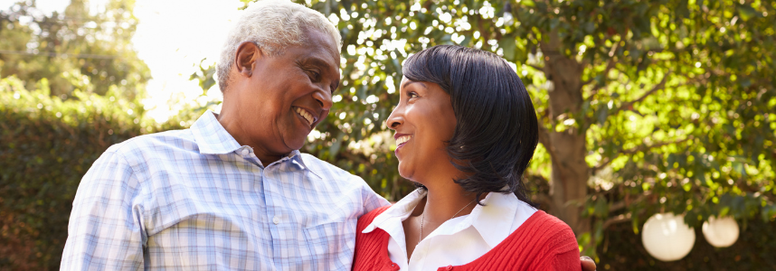 Smiling couple spending time outdoors.