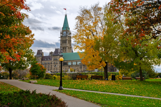 Parliament Buildings in autumn seen from Major's Hill Park in Ottawa, Canada.