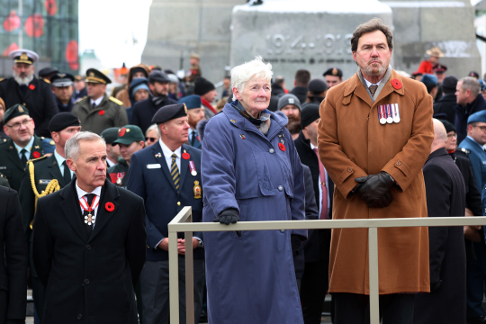 Silver Cross Mother Nancy Payne with Prime Minister Mark Carney and Deputy of the Governor General and Chief Justice of Canada Richard Wagner.