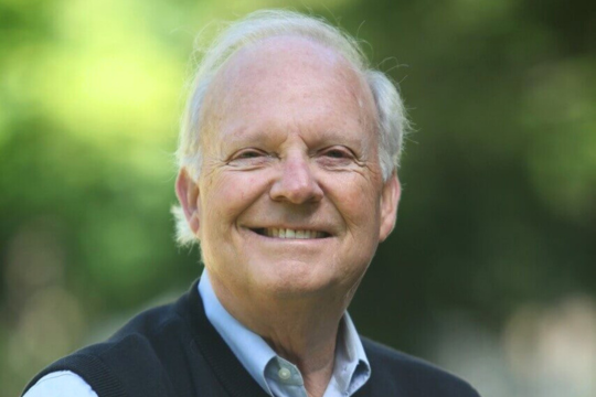 Dr. Riley E. Moynes.