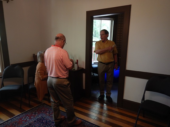 Meet and Greet 3 Board members having a discussion