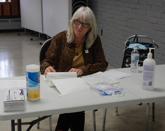 Dianne Michals at the registration desk