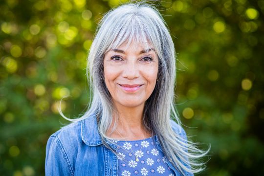 Smiling adult woman.