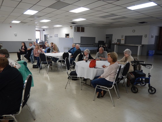 Members listening to reports from Board members