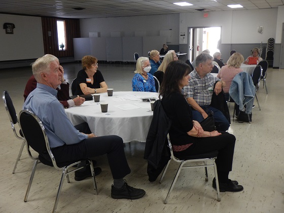 Members listening to reports from Board members