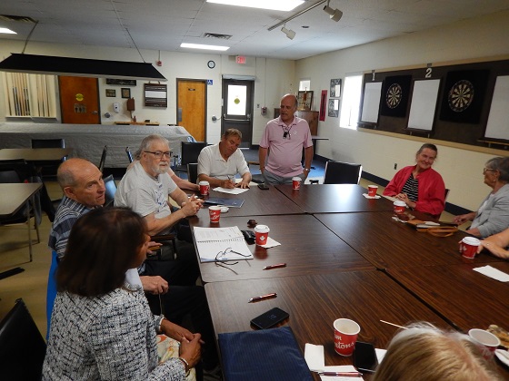 Photo 7 Starting at the bottom left with Pam, Ray, Bryan, John Ferguson, Chris Auger, President (standing), Lisa and Joan Gauthier