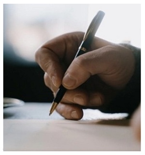 Hand writing on paper.