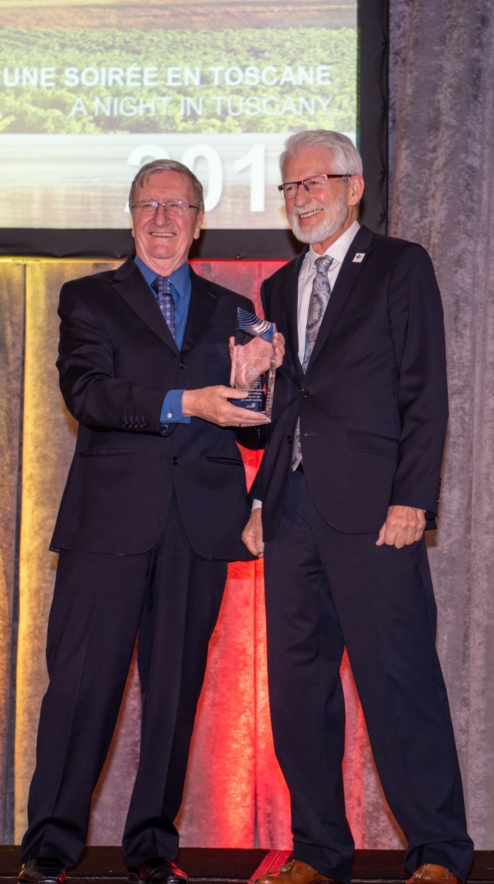 Association president Jean-Guy Soulière. left, and Jean-Marc Demers