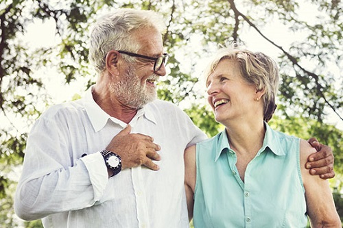 A senior couple having a conversation.