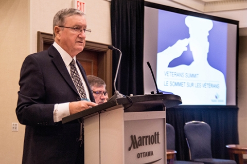 Association president, Jean-Guy Soulière, speaks at the Veterans Summit. Association president, Jean-Guy Soulière, speaks at the Veterans Summit.
