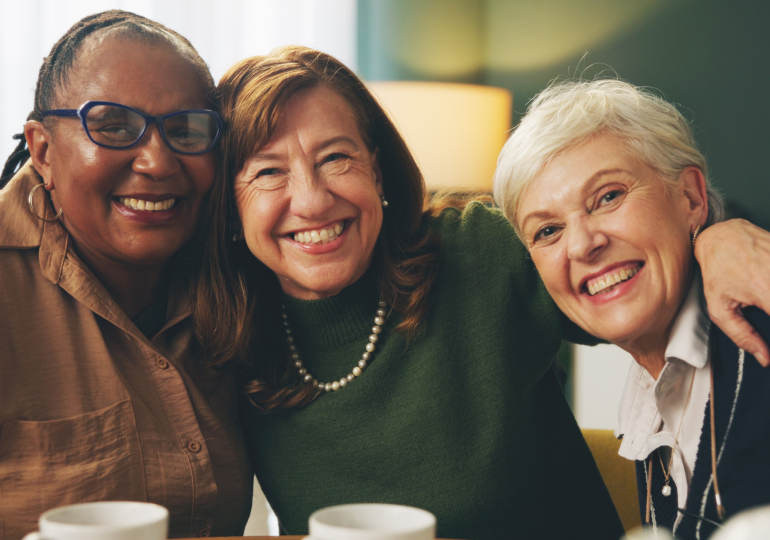 Group of smiling women.