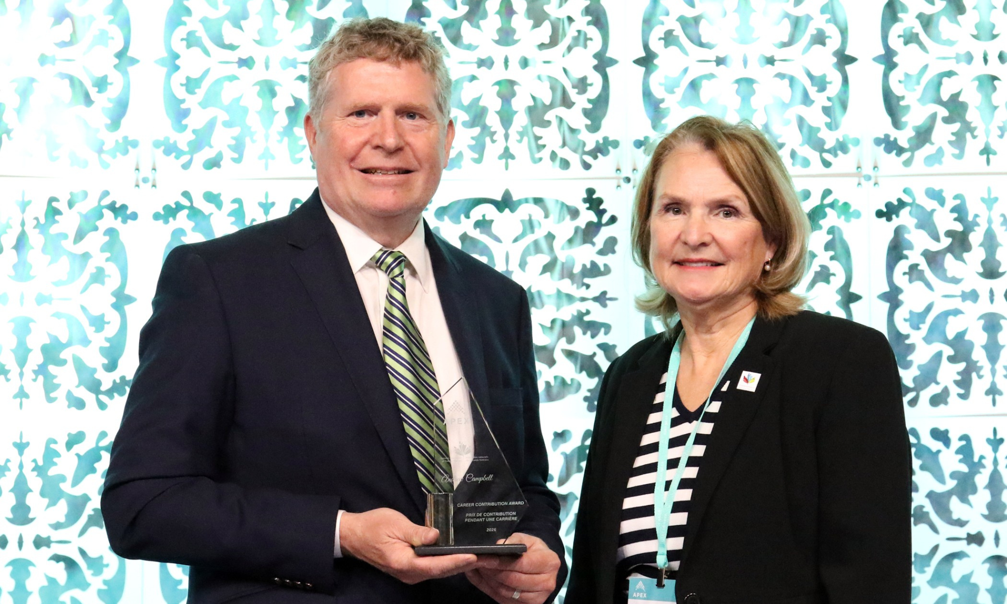 Andrew Campbell, recipient of the 2026 APEX Career Contribution Award, with Gisèle Tassé-Goodman.