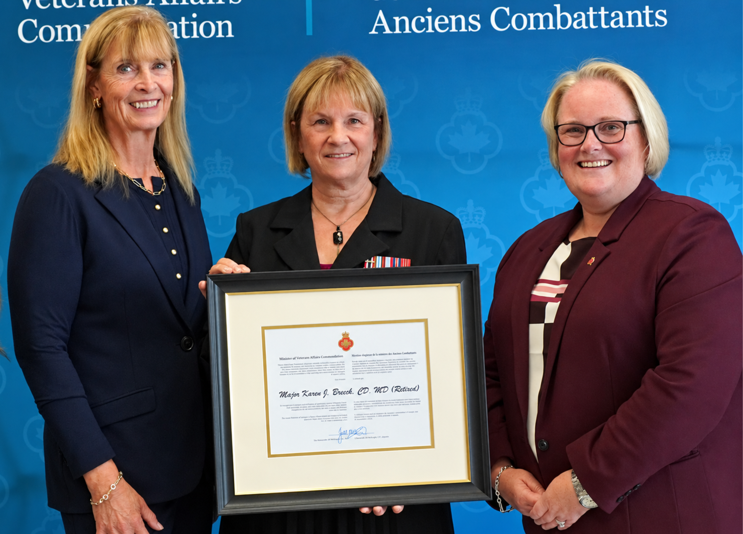 Karen Breeck (centre), recipient of the Minister of Veterans Affairs Commendation, with Federal Retirees national director Sharon Squire (left) and Veterans Affairs Minister Jill McKnight (right).